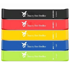 May include: Set of five resistance bands in black, red, yellow, blue, and green. The bands are labeled with the brand name "Buzzy Bee Bodiez" and resistance levels: X-Heavy, Heavy, Medium, Light, and X-Light.