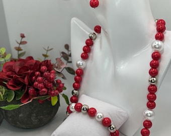 Red and white women's jewelry set with silver accents  (includes necklace, bracelet, earrings)