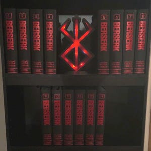 Letrero luminoso del sacrificio de Berzerk