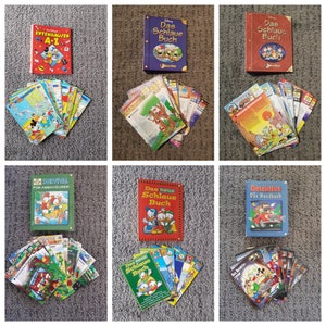 Può includere: Una collezione di 10 fumetti Disney vintage con Paperino. I libri sono di vari colori, tra cui rosso, blu e verde. Le copertine presentano illustrazioni di Paperino in diverse situazioni, come la vela, la guida di un'auto e il gioco del detective. I libri sono tutti in tedesco.