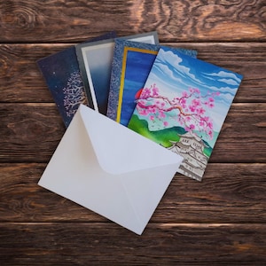 Choix de 4 cartes sans texte avec enveloppes format A2 (4.5x5 po) à thématique nordique ou japonaise.