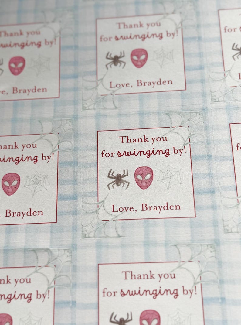 May include: Square stickers with a Spider-Man theme. Each sticker has the text "Thank you for swinging by!" and "Love, Brayden". The stickers feature a spider, a Spider-Man mask, and a spiderweb.