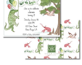 May include: Watercolor invitation with a bayou theme. The invitation features an alligator holding balloons and a flag that says "tw' da bayou". The invitation also includes a pelican, crawfish, and tree illustrations. The back of the invitation has a repeating pattern.