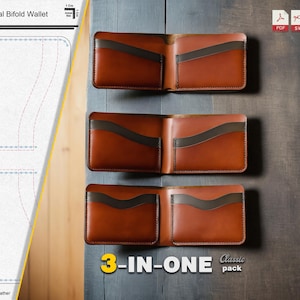 May include: Three leather bifold wallets in brown and black with a 3-in-one classic pack label. The wallets are displayed on a wooden surface.