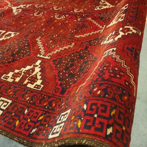 Vintage Hand-Knotted Afghan Bukhara Rug: Tribal Red Wool Carpet (6x5 ft)