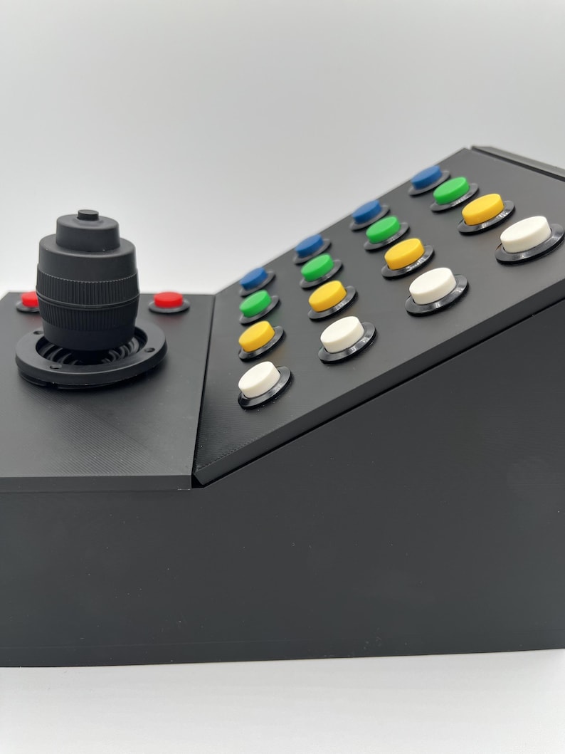 Close up side view of the top portion of the farming simulator button box.