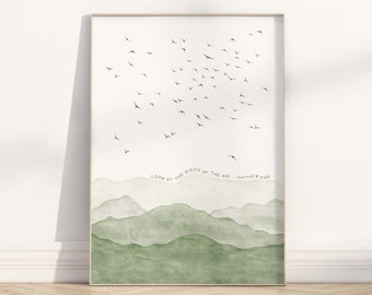 May include: A watercolor print with a green mountain landscape and a flock of birds flying above. The text "Look at the birds of the air - Matthew 6:26" is written below the birds.