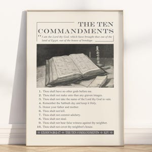 May include: A black and white illustration of an open book with the text "THE TEN COMMANDMENTS" and the ten commandments listed below. The text "EXODUS 20:2-17 THE TEN COMMANDMENTS KJV" is at the bottom of the image.