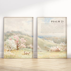 May include: A pair of framed prints with a watercolor painting of a pastoral landscape with blooming trees and sheep. The right print features the text "PSALM 23" and the full text of the psalm.