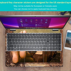 May include: A laptop computer with a keyboard sticker featuring a painting of a woman's feet in a gold frame. The keyboard sticker is designed for the US standard layout. The text on the screen reads "Keyboard Key character stickers are designed for the US standard layout. May not be suitable for European or Canada users. You can choose not to apply keyboard key stickers."