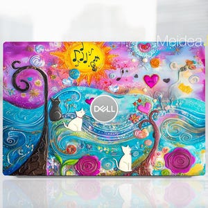 May include: A colorful laptop skin with a whimsical design featuring a sun, clouds, musical notes, hearts, and two cats. The skin has a blue, pink, and yellow color scheme and features the word "DELL" in a white circle.