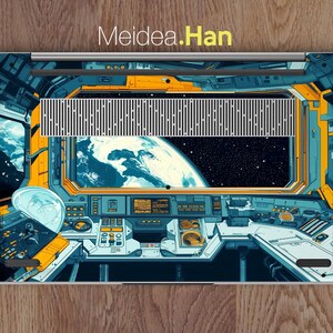 May include: A laptop skin with a futuristic space-themed design. The image shows a view from inside a spaceship looking out at Earth. The skin features a control panel with buttons and dials, and the text "Meidea.Han" is visible at the top.