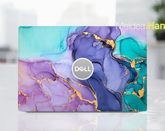 May include: A laptop skin with an abstract design featuring swirls of purple, teal, and gold. The Dell logo is visible in the centre of the skin.