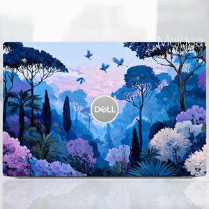May include: A laptop skin featuring a vibrant forest scene in shades of blue, purple, and white. The design includes trees, flowers, and flying birds, with a Dell logo in the center. The overall theme is nature and art.