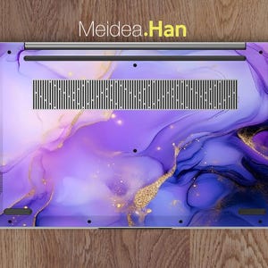 May include: Purple and gold laptop skin with a marbled design. The skin has a subtle shimmer and a modern abstract look.