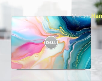 May include: A laptop computer with a colourful abstract design featuring pink, blue, and gold swirls. The Dell logo is visible on the laptop.