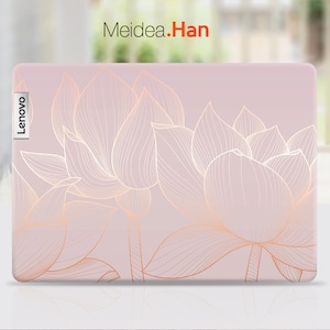 May include: A Lenovo laptop case with a light pink background and a gold lotus flower design. The lotus flowers are intricately drawn with delicate lines. The brand name "Meidea.Han" is in the top right corner.