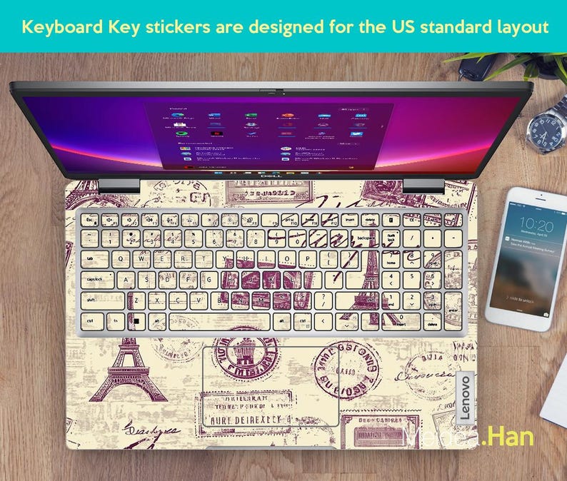 May include: A laptop keyboard with a vintage travel themed sticker set. The stickers feature images of the Eiffel Tower, stamps, and other travel-related designs. The text "Keyboard Key stickers are designed for the US standard layout" is visible at the top of the image.