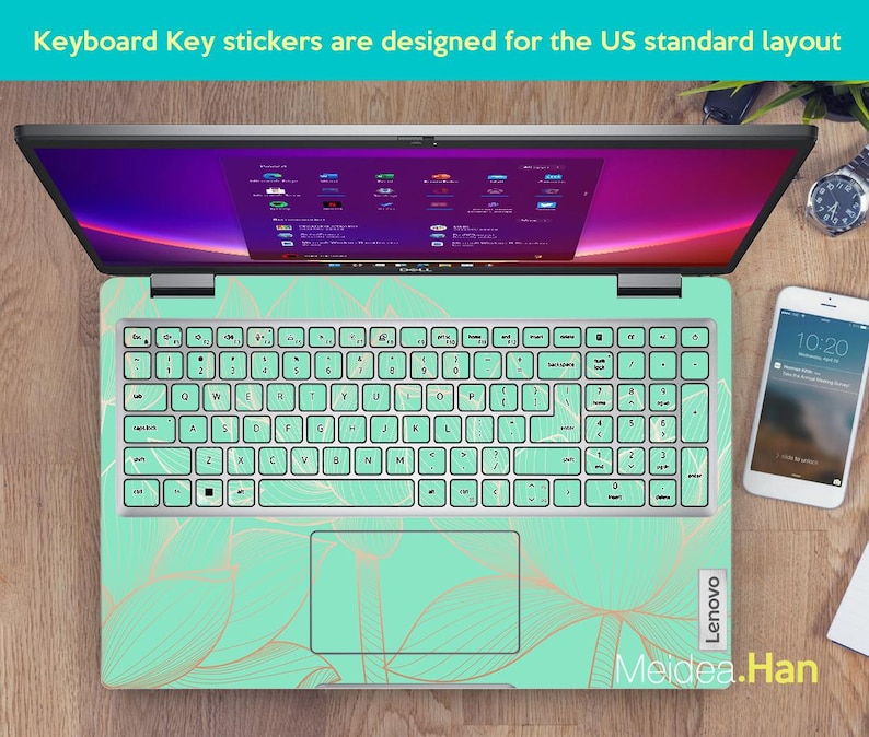 May include: A laptop computer with a green and gold keyboard sticker featuring a leaf design. The sticker is designed for the US standard keyboard layout. The text "Lenovo" and "Meidea.Han" are visible on the sticker.
