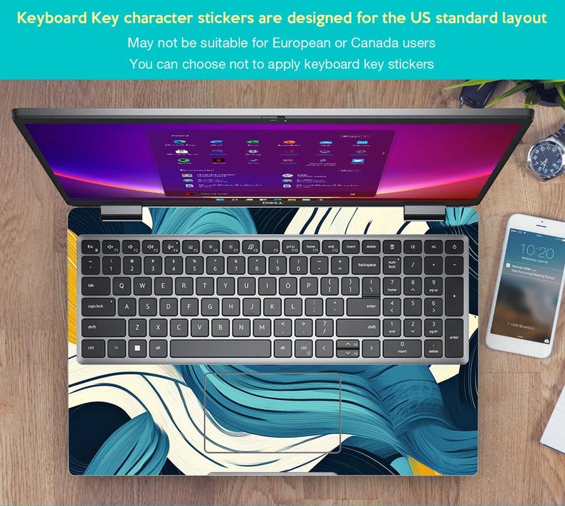 May include: A laptop computer with a blue and white abstract design keyboard sticker. The sticker features a swirling pattern of blue and white lines on a dark background. The laptop is open and the screen is displaying a desktop with multiple icons.