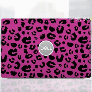 May include: Pink laptop skin with a black leopard print design. The skin has a Dell logo in the center.