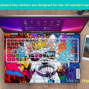May include: Colourful keyboard stickers featuring a white dog graphic and graffiti design. The stickers are designed for a US standard keyboard layout. The text "Lenovo" and "Meidea.Han" are visible on the laptop.