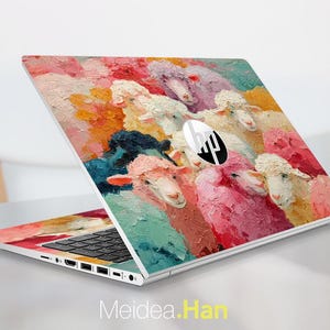 May include: A laptop with a colorful, impressionistic painting of sheep. The artwork features a palette of pink, orange, blue, and white. The HP logo is visible on the laptop. The text "Meidea.Han" is at the bottom.