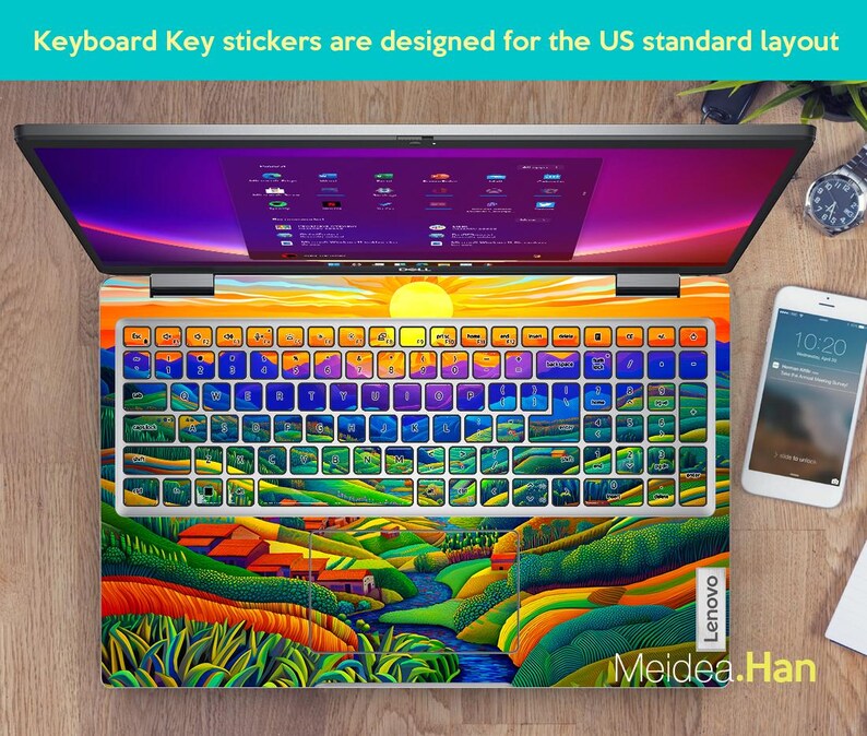 May include: A laptop keyboard with colourful landscape stickers. The stickers feature a sunset, mountains, and a river. The keyboard is labelled "Lenovo".