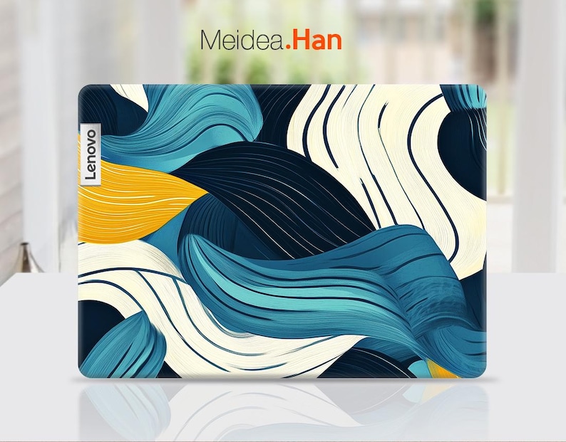 May include: A laptop skin with an abstract design featuring blue, white, and yellow wavy lines. The skin has the word "Lenovo" printed on the left side.