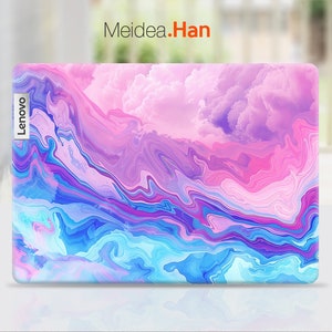 May include: A laptop skin with a colorful abstract design featuring swirls of pink, blue, and purple. The design resembles clouds and has a marbled effect. The skin has the word "Lenovo" printed on the left side.