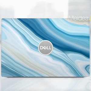 May include: A blue and white marble laptop skin with a silver Dell logo in the center.