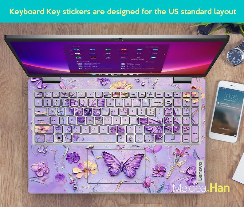 May include: Purple and white keyboard stickers with a butterfly design. The stickers are designed for a US standard keyboard layout. The stickers are shown on a laptop keyboard.