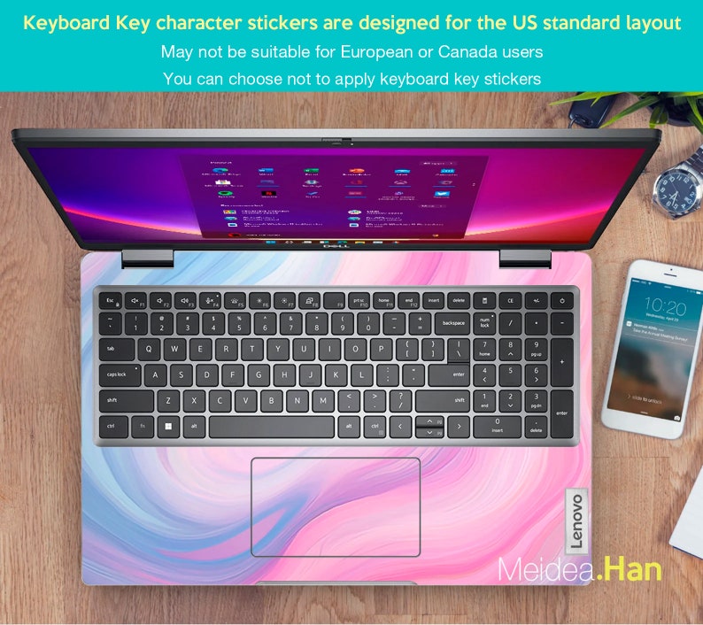 May include: A silver laptop computer with a pink and blue marbled design on the bottom half of the laptop. The keyboard has black keys with white lettering. The laptop is open and the screen is showing a blue and purple background with several icons.