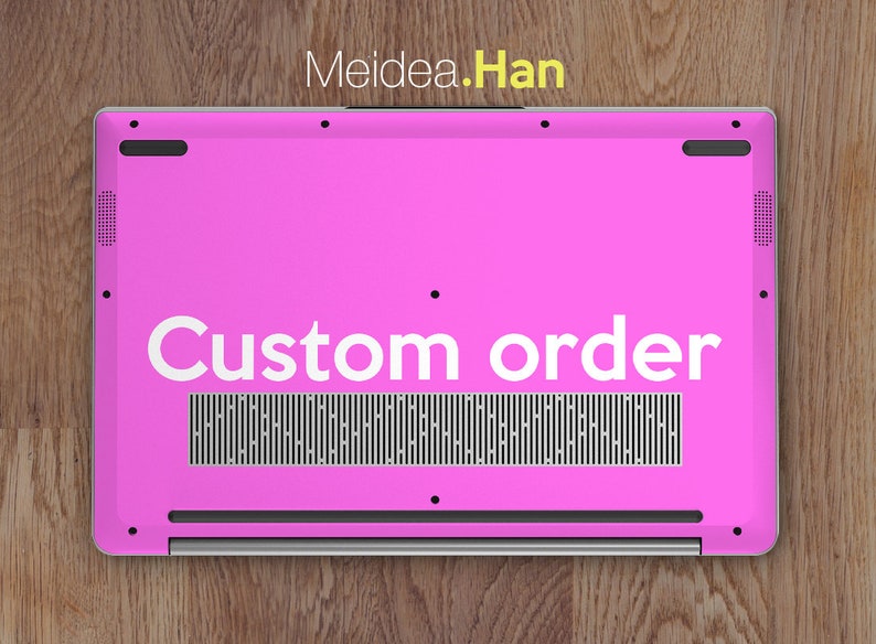 May include: The bottom of a pink laptop with the text "Custom order" printed in white on the back.