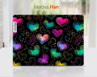 May include: A black laptop case with a colorful heart pattern. The case has the word "Lenovo" printed on the side.