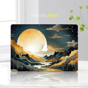 May include: A laptop skin with a design of a large, golden moon over a landscape of mountains and a river. The sky is dark blue with stars and clouds. The text "Meidea.Han" is at the top of the image.