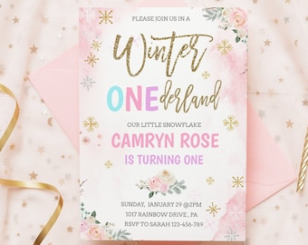 May include: A pink and white invitation with gold glitter text that reads "Please join us in a Winter Wonderland. Our little snowflake Camryn Rose is turning one. Sunday, January 29 @ 2PM. 1017 Rainbow Drive, PA. RSVP to Sarah 123-456-789". The invitation has a watercolor background with snowflakes and flowers.