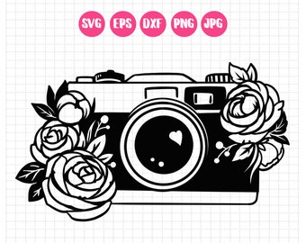 May include: Black and white silhouette of a vintage camera with a heart in the lens surrounded by roses.