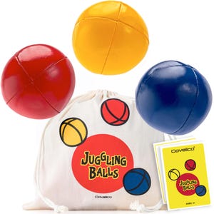 May include: A set of juggling balls in red, yellow, and blue. The balls are displayed with a drawstring bag featuring the words "Juggling Balls" and a matching set of cards. The balls are made of a shiny material.