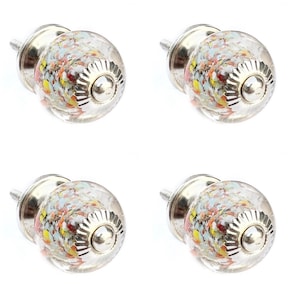 May include: A set of three ceramic mugs with a speckled, matte finish. The mugs are in shades of cream, light gray, and dark gray. Each mug has a simple, minimalist design, perfect for coffee or tea.