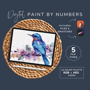 May include: Digital paint by numbers image of a blue bird on a branch with pink and purple watercolor flowers. The image is displayed on a tablet computer on a woven mat. The image includes 5 file types, 24 color palettes, and RGB and HEX codes.