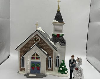 Afdeling 56 Afdeling 56 Snow Village Woodlake Chapel Trouwset 55068 Bekijk foto's