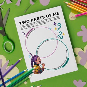 May include: A white sheet with the title "TWO PARTS OF ME" and an illustration of a woman with purple hair. The sheet has two overlapping circles with prompts. Green scissors, coloured pencils, and paper cutouts are scattered around.