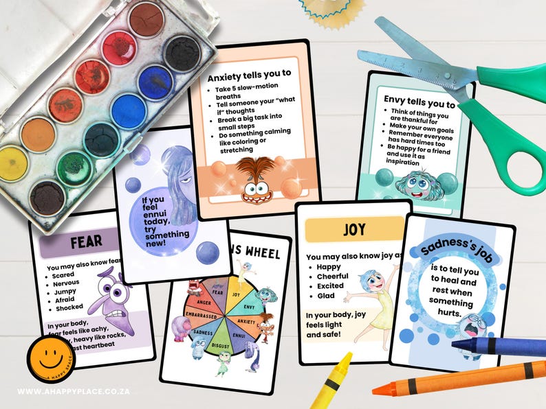 May include: A watercolor paint set with various colors and cards with text about emotions. The cards feature characters and phrases like "Anxiety tells you to" and "Joy". Scissors and crayons are also visible.