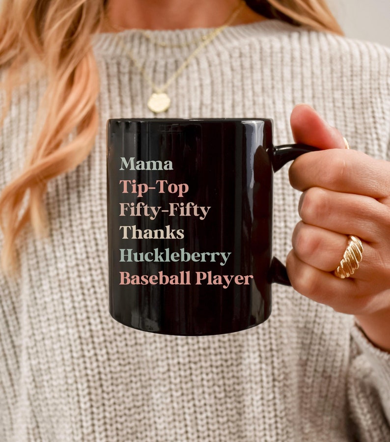 nurse coffee mug for the ER and ICU nurses that says mama, tip top, fifty fifty, thanks, huckleberry, baseball player on a black ceramic mug making the perfect nurse coworker gift