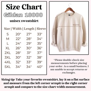 May include: A beige Gildan 18000 unisex sweatshirt on a hanger, with a size chart showing measurements in inches. The chart includes sizes S to 5XL, detailing width, length, and sleeve dimensions. Instructions are provided for measuring a sweatshirt.