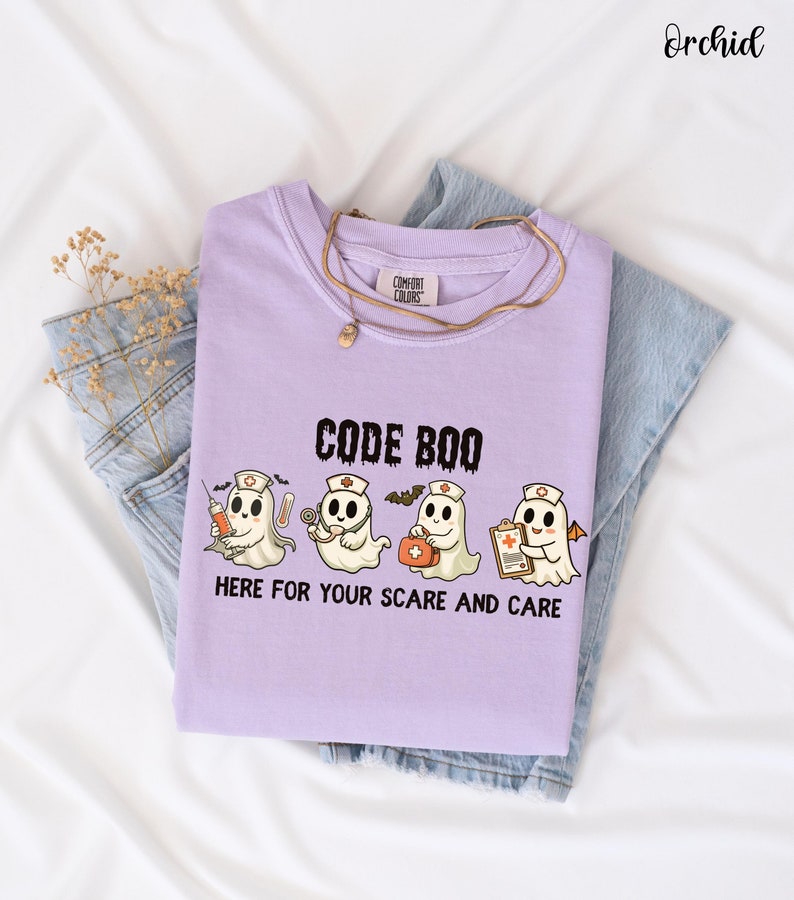 nurse Halloween Comfort Colors shirt that has 4 spooky nurses reading Code Boo: here for your scare and care for er nurse or nightshift nurse in the color orchid purple