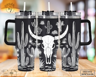 May include: A black and white tumbler with a design of a bull skull and cacti. The tumbler has a handle and a lid. The design is in a minimalist style.