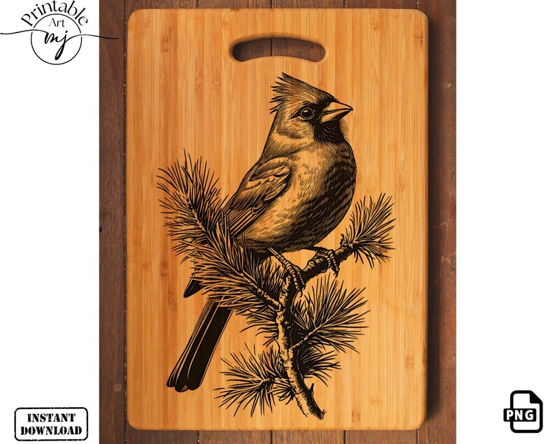 May include: A wooden cutting board with a laser engraved design of a cardinal bird perched on a pine branch. The design is in black and brown on a natural wood background.