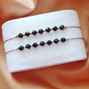 Schwarzer Achat Schutz Armband Seidenkordel mit faccetierten Achat Perlen Kraftarmband Talisman Amulett als Geschenk verpackt + Achat Karte
